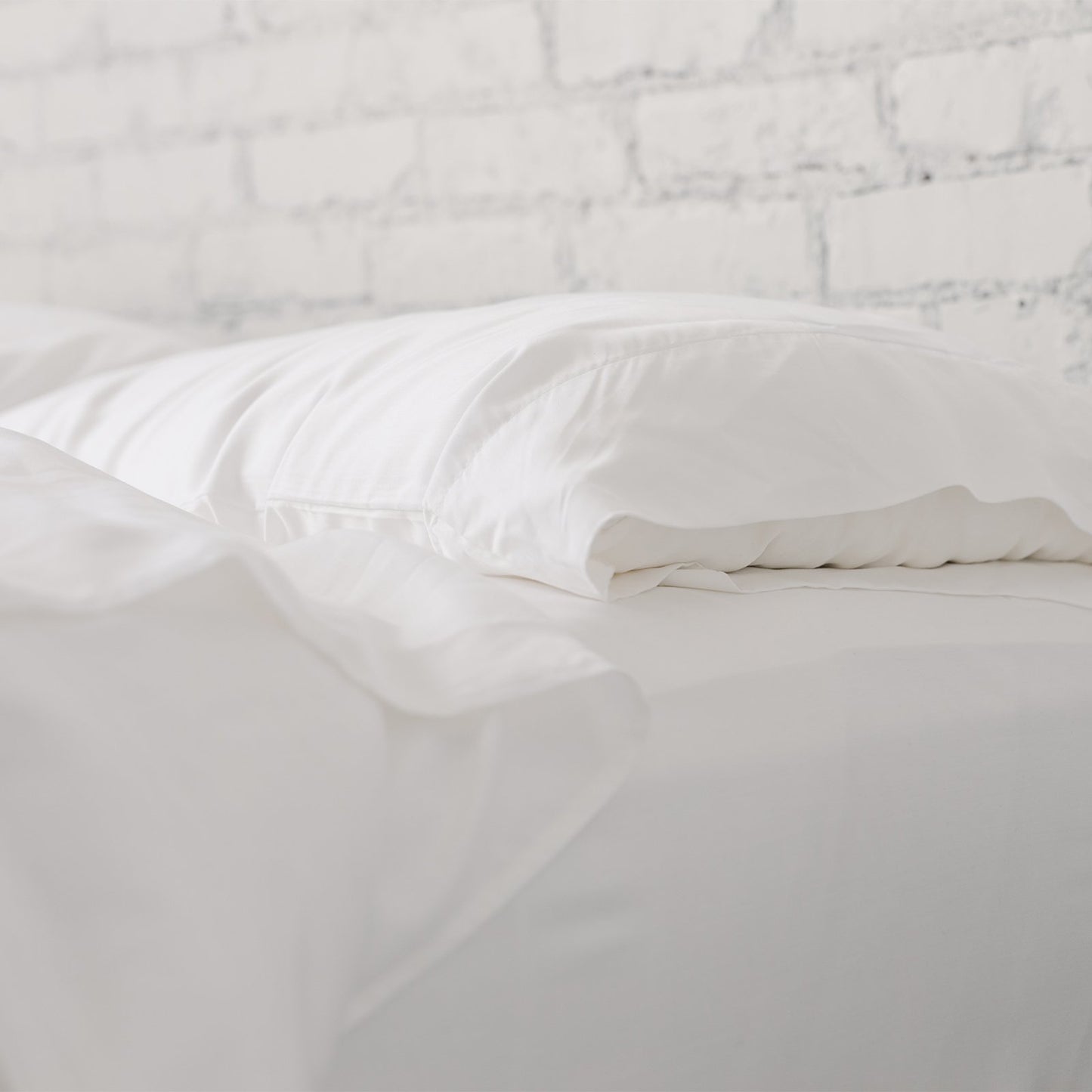 silk pillows on a bed