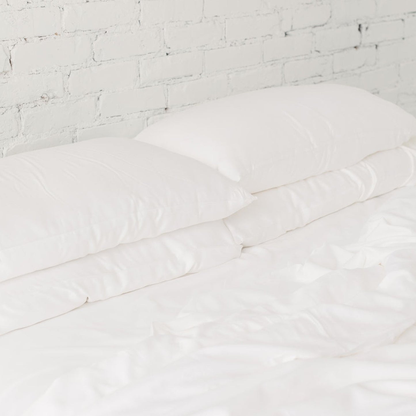 silk pillows on a bed